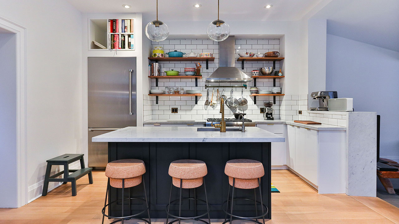 Image of white kitchen with open shelving.