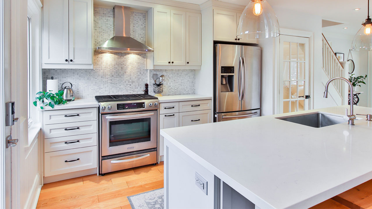 Image of traditional kitchen with white cabinets.