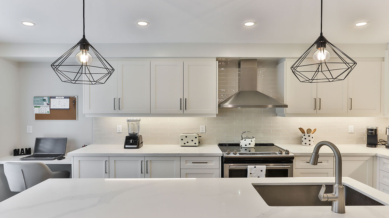 Image of white design kitchen.