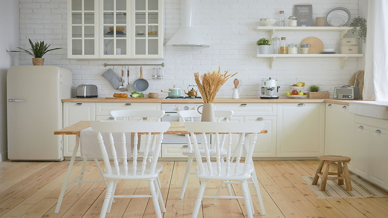 Image of farmhouse style kitchen with white cabinets.