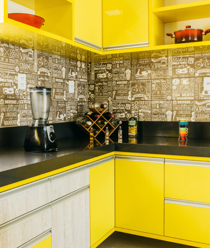 Black and white tale in a yellow kitchen