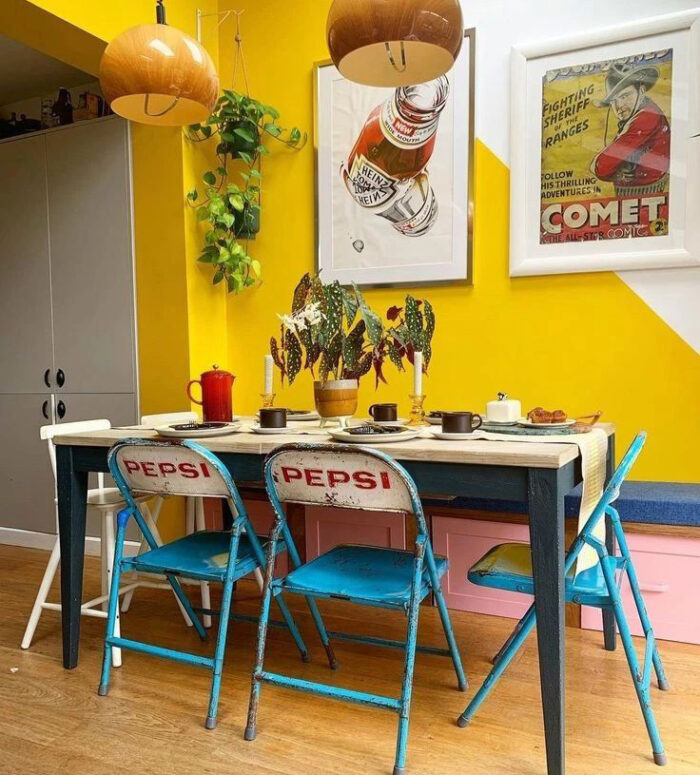 Dinning table with vintage chairs nearby