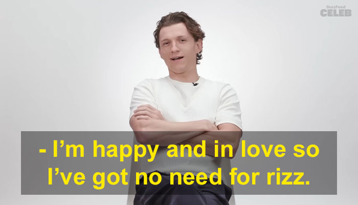 Young man in a white shirt discussing the Gen Z-popular term "rizz" in a BuzzFeed Celeb video, arms crossed confidently. Young man in a white shirt discussing the Gen Z-popular term "rizz" in a BuzzFeed Celeb video, arms crossed confidently.