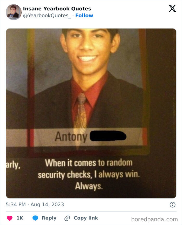 Smiling young man in suit with a yearbook quote about winning random security checks, showcasing epic yearbook quotes.