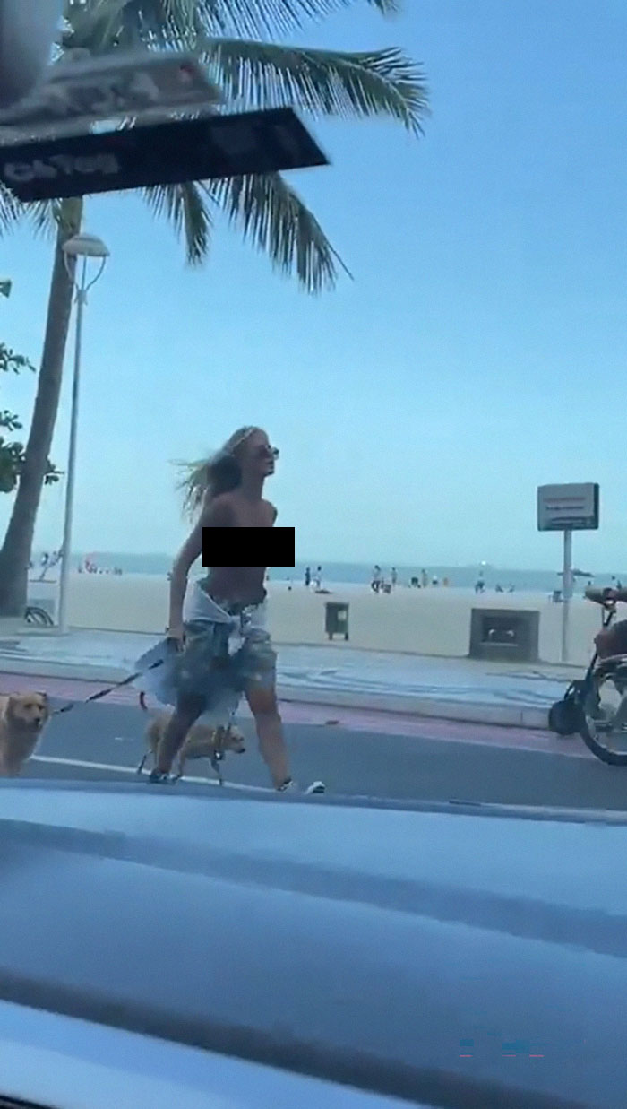 “I Don’t See The Problem”: Topless Dog Walker Caroline Werner Sparks Debate On “Double Standards”