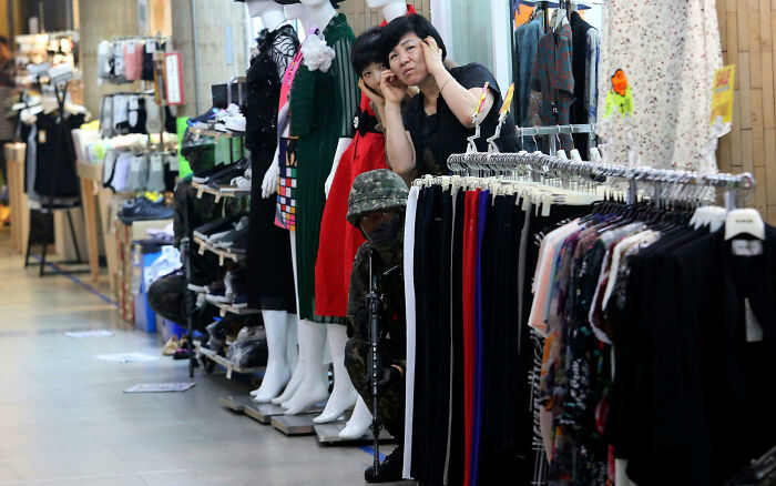 South Korean Soldiers Blending In During A Counter-Terrorism Exercise At A Subway Station (3 Soldiers)