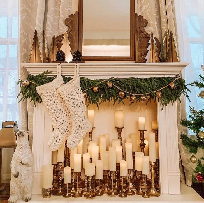 Fireplace with candles of different sizes