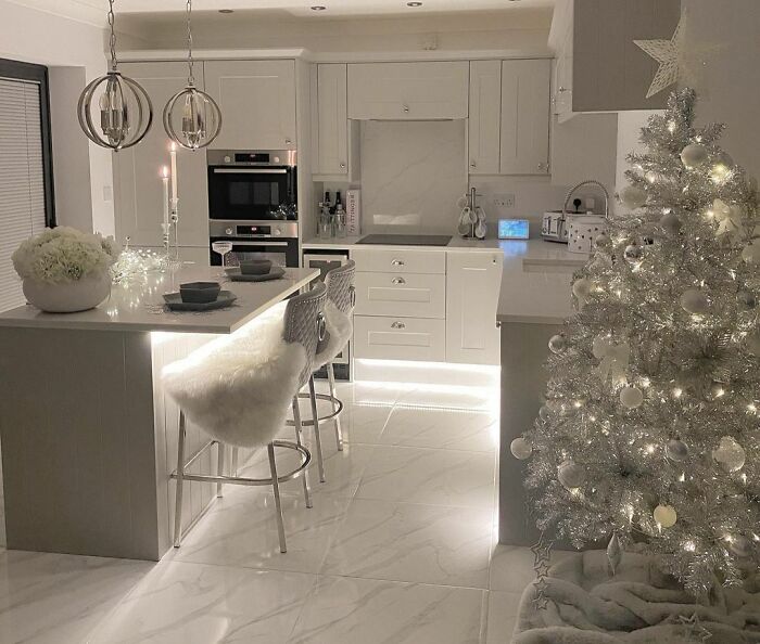 Silver christmas tree in kitchen