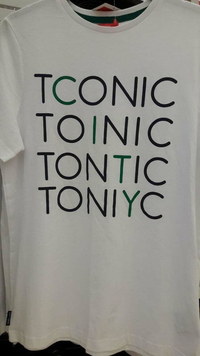 Coty ? Toinic ? I Can't See Any Real Words On This Shirt