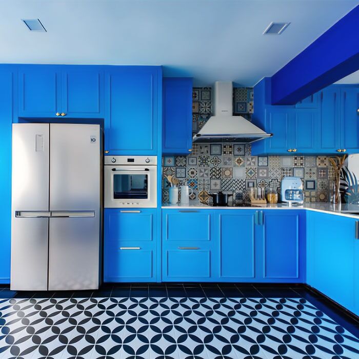 Dark blue kitchen cabinets with mozaic tiles