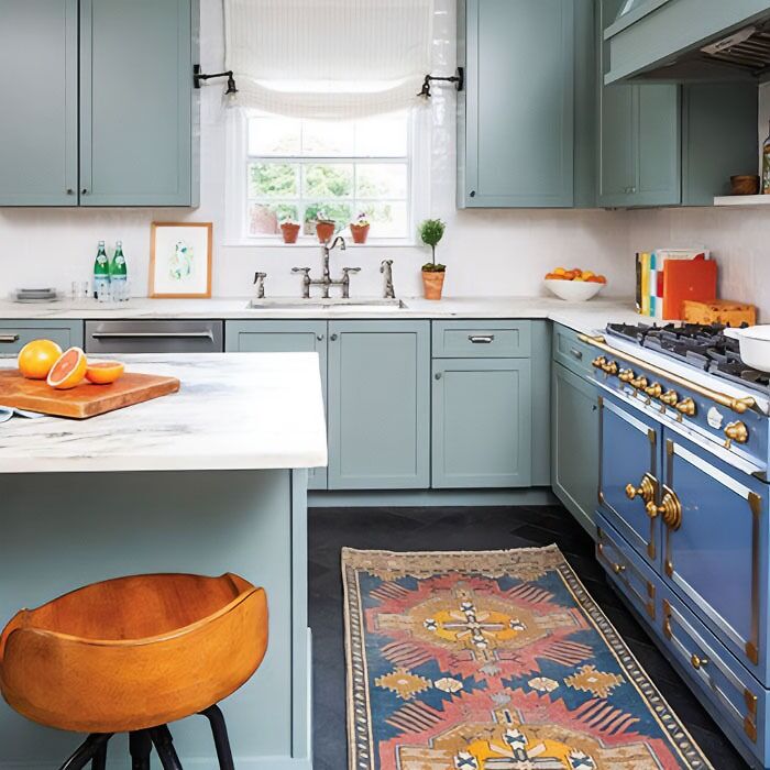Light blue kitchen cabinets with blue owen