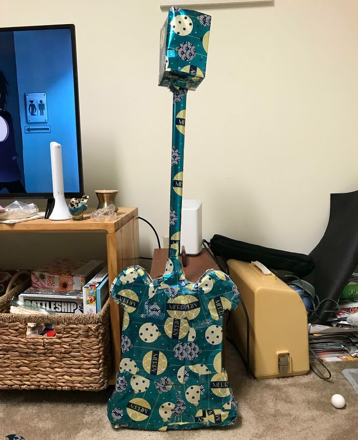 A Board Game Wrapped Like A Guitar