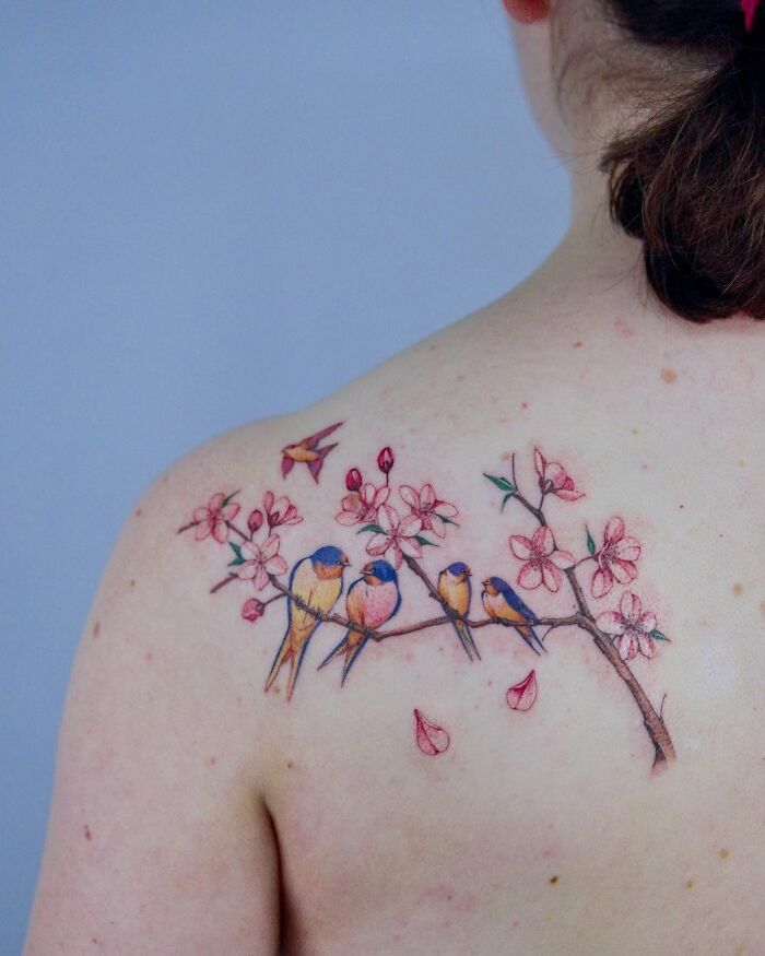 Watercolor cherryblossom branch with birds tattoo on back