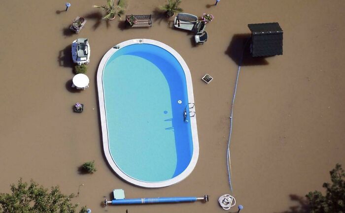 A Pool Untouched By The Brown Flood Waters