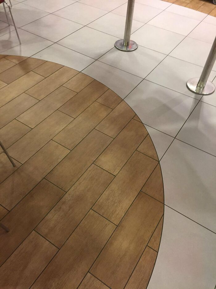 Different Floor Patterns Transition Flawlessly. [x-Posted From R/Mildlyinteresting]