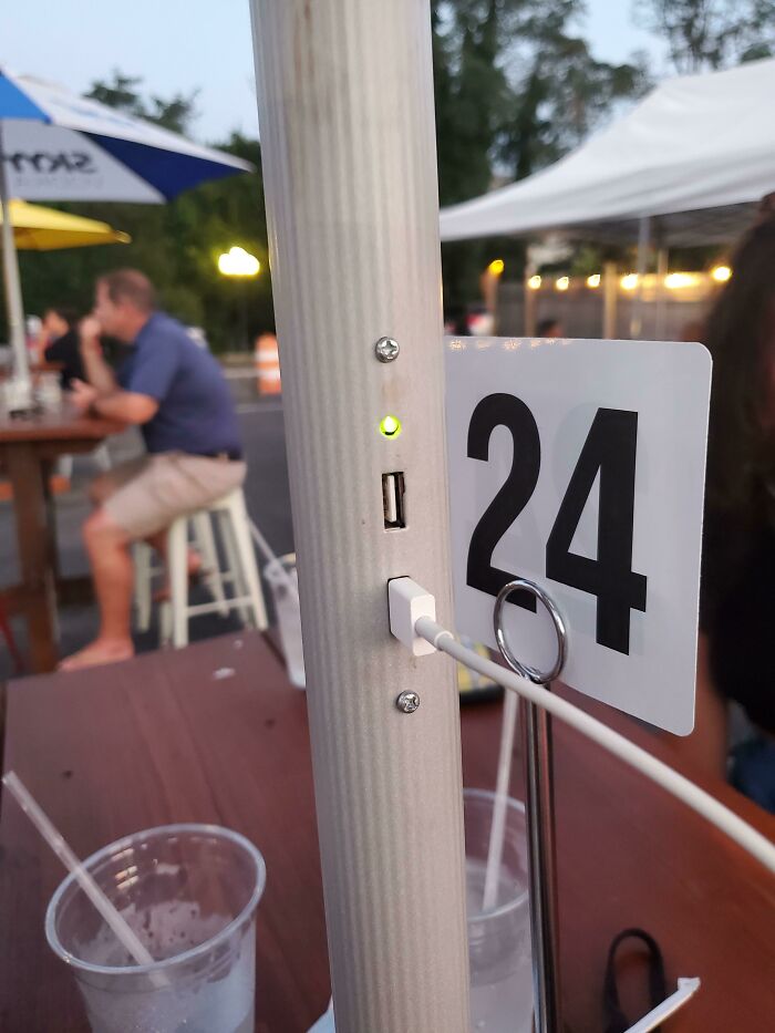 This Restaurant He Went Has Solar-Powered Phone Chargers Built Into The Umbrellas
