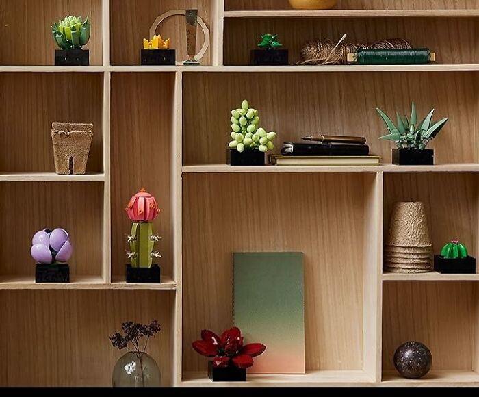 Different LEGO plants on the bookshelf