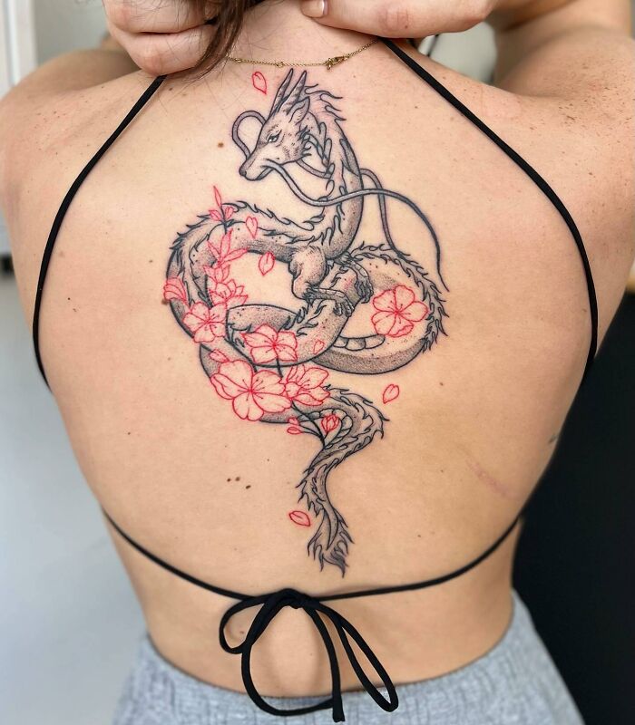 Dragon and red flowers tattoo on back