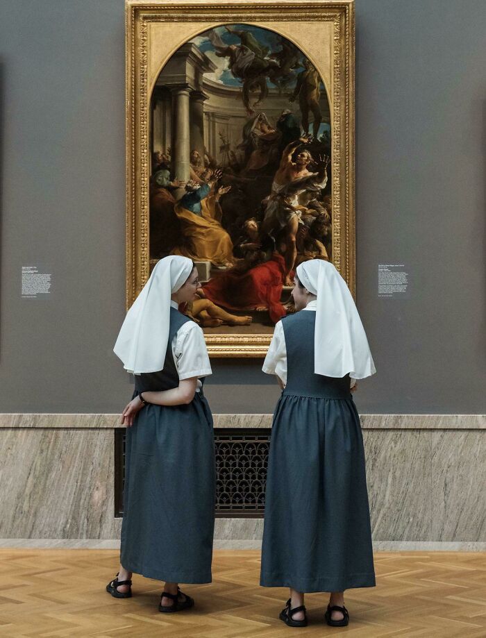 Two Nuns Discuss A Painting