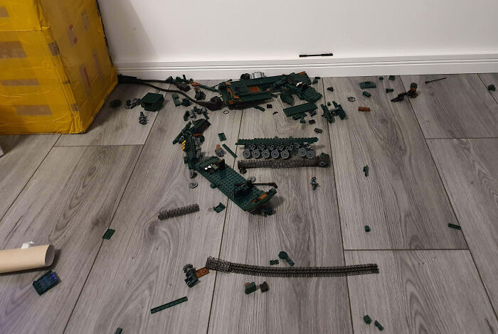 One Of My Cats Threw My 1400 Piece LEGO Tank From The Shelf It Was Sitting On, Destroying 9 Hours Of Work On New Year's Eve