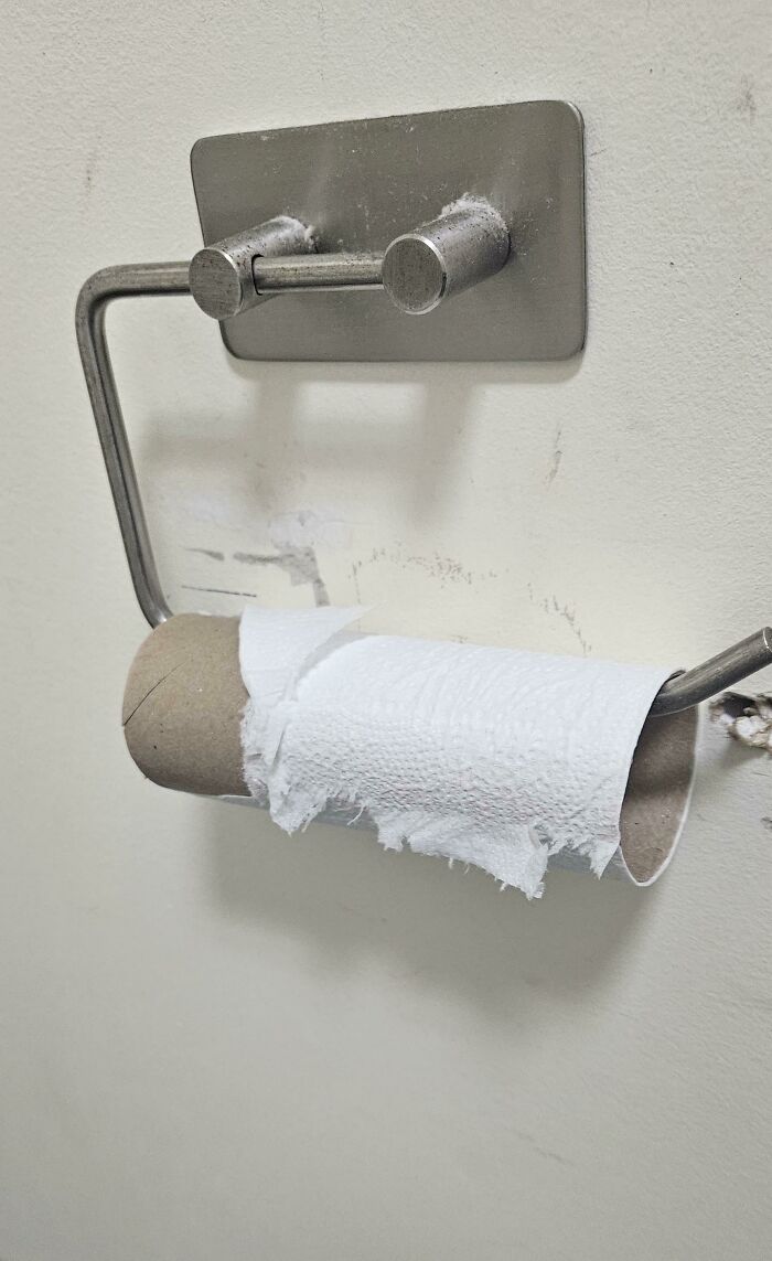 My Fully Grown Adult Co-Workers Love To Pull This Move To Avoid The Very Tedious Task Of Throwing The Empty Roll In The Trash And Putting A New One In Its Place