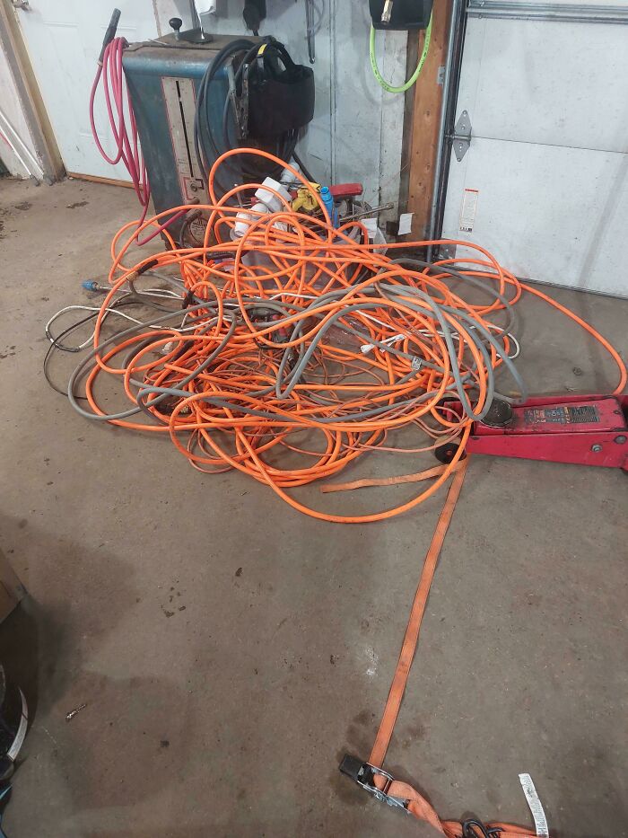 Coworkers Have Done This Atleast 50 Times Now, It's 100ft Of Power Cord And Air Hose (100' Each), A Long Frozen Pressure Washer Hose And Another Cord