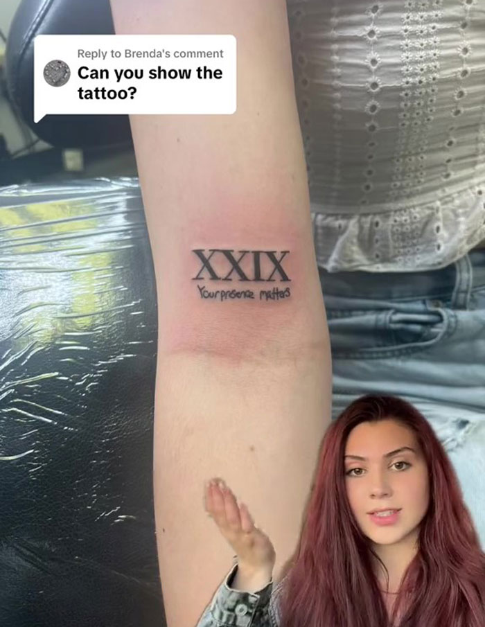 Tattoo of teacher's meaningful handwritten note, "Your presence matters," on a student's arm. Tattoo of teacher's meaningful handwritten note, "Your presence matters," on a student's arm.