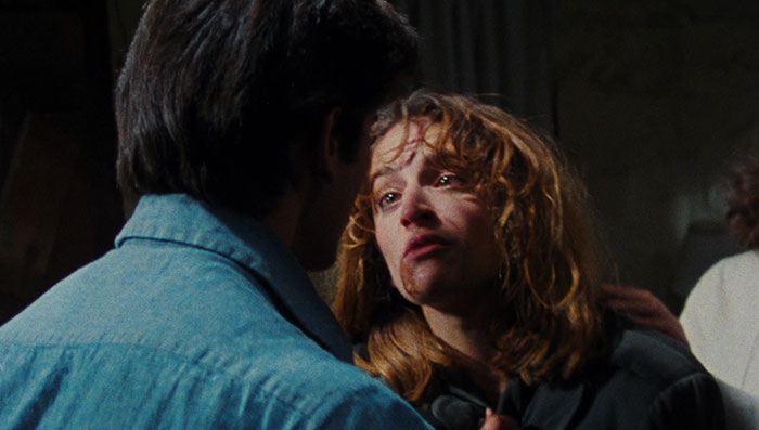 Woman looking scared at the man 