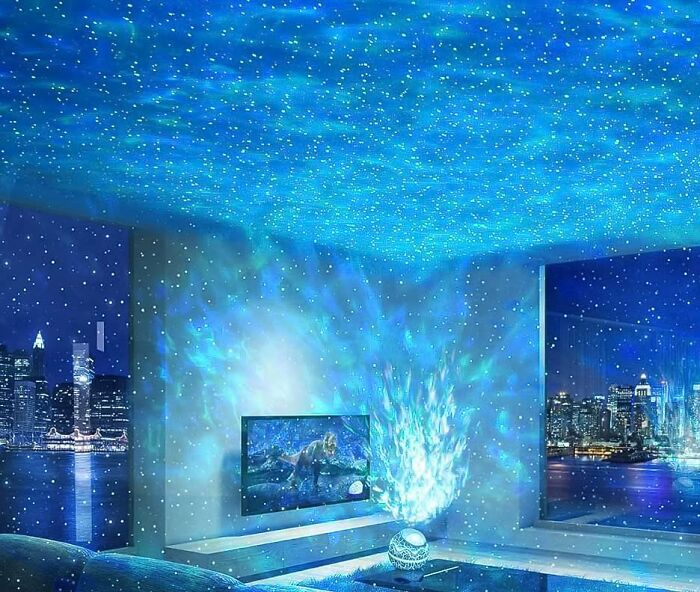 Blue galaxy LED light projector in the room