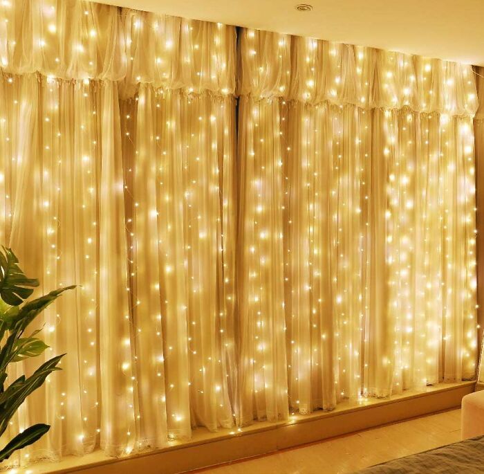 Curtains with yellow fairy lights