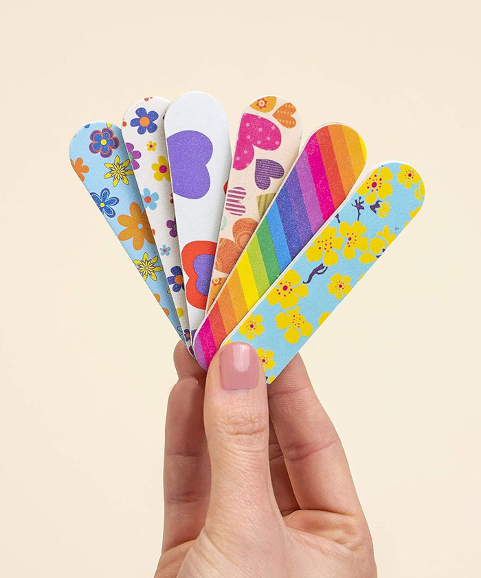 Colorful Girly Mini Emery Board Nail Files: Or as I like to call them, my "nail lifesavers", keep your nails neat and perfectly defined no matter where you are. This set of 12 double-grain files is as practical as it is cute, and at this size, they're a total breeze to carry around in your bag!
