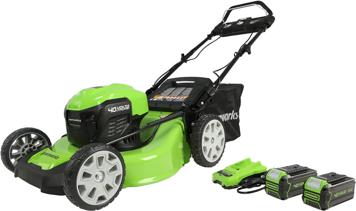 Green and black lawn mower with batteries