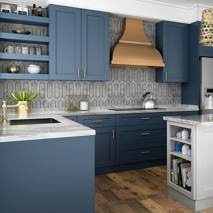 Blue kitchen cabinets with brass accents