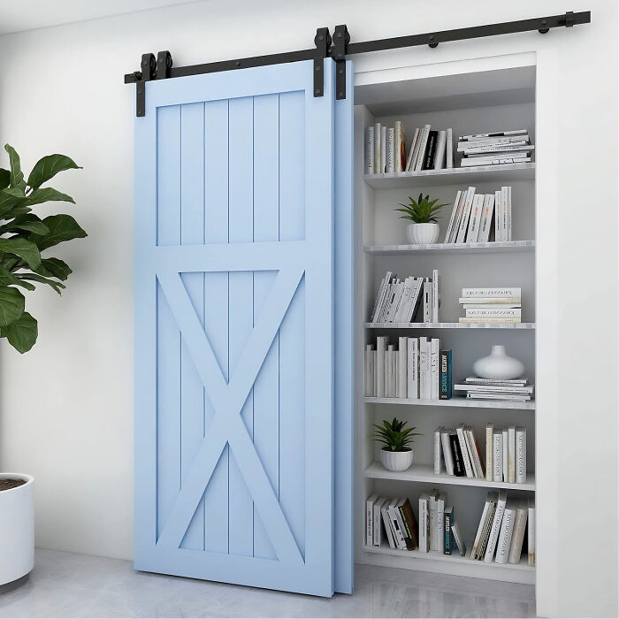 Blue bookshelf with sliding doors
