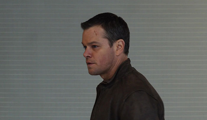 Matt Damon Walking with a scar on his forehead 