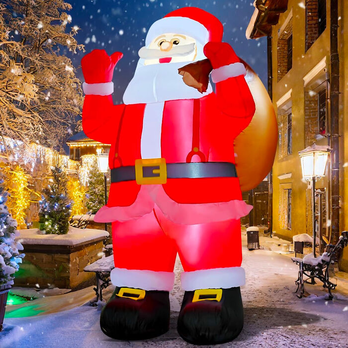 a big Santa figurine in the street