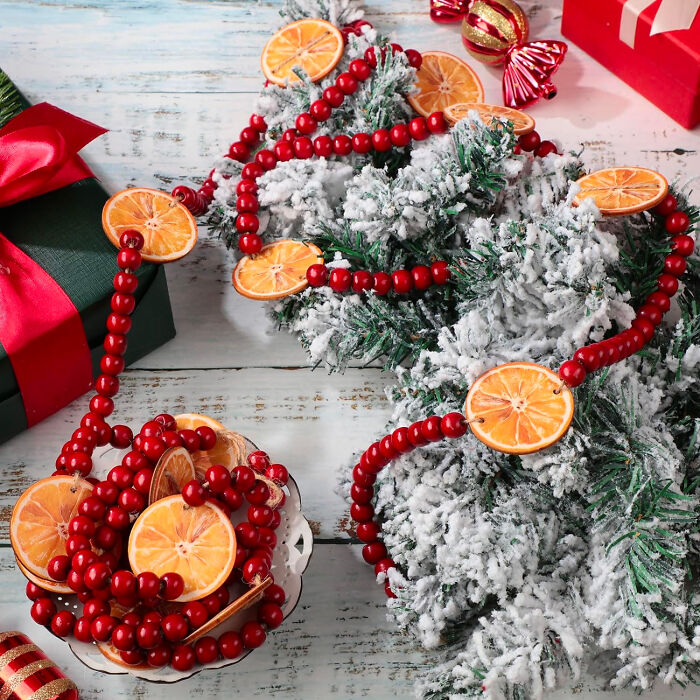 Citrus garlands as decoration on fir