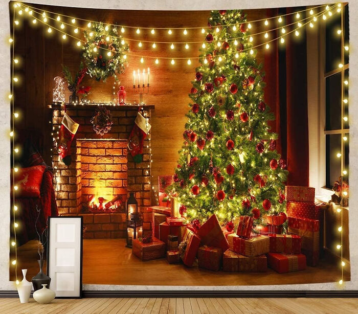Green christmas tree near fireplace