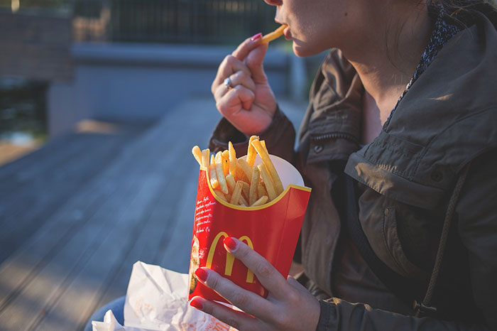 Women eating fries