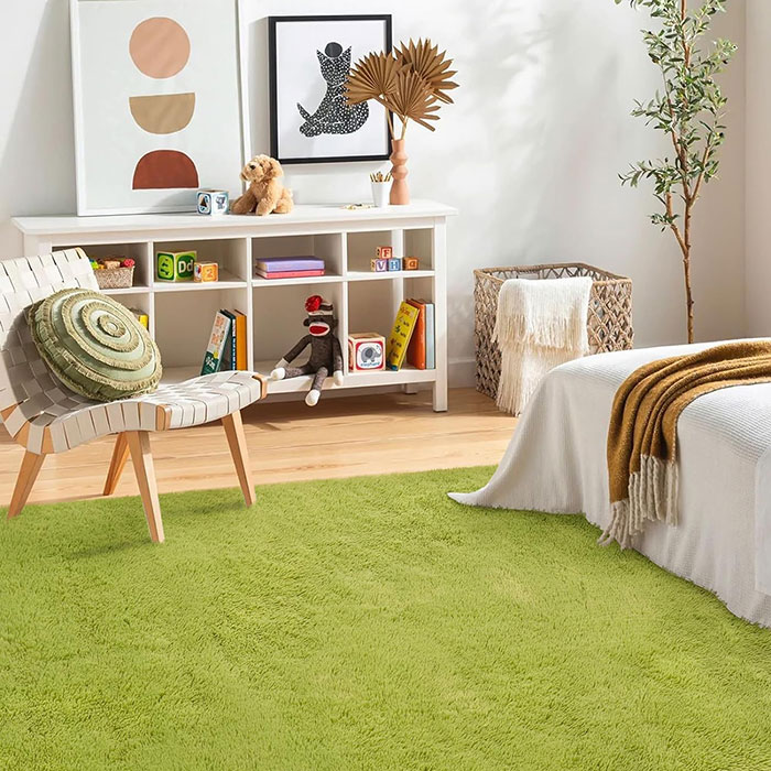Green rug in a bright kid's room 
