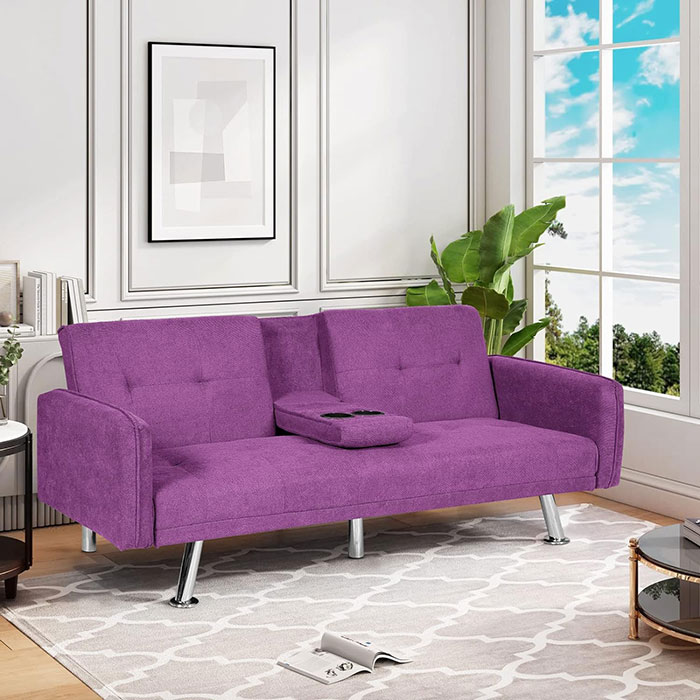 Radiant Orchid colored sofa in a room Radiant Orchid colored sofa in a room