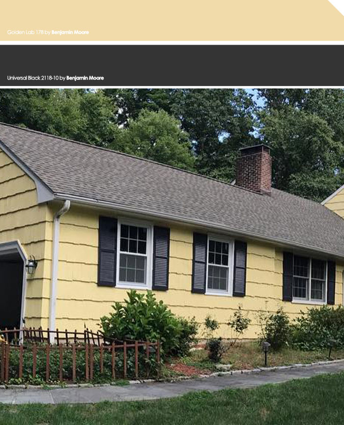 Yellow painted house with black shutters and a gray roof showcasing exterior house colors to turn heads in the neighborhood.