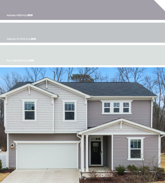 Modern grey painted house exterior with white trim and a black roof showcasing appealing exterior house colors.