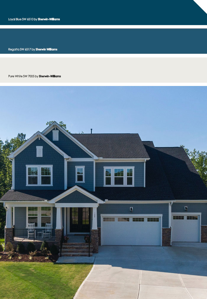 Blue painted modern house showcasing popular exterior house colors to turn heads in the neighborhood on a sunny day