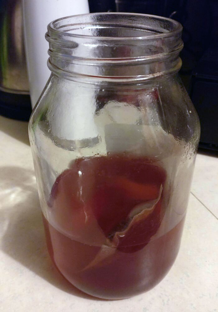 Steeping Hot Tea In The Honey Jar To Use Every Last Bit Of Honey