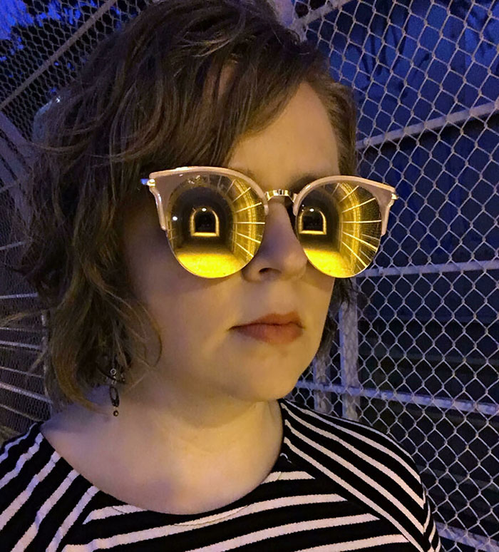 Reflection Of Tunnel In Mirrored Sunglasses