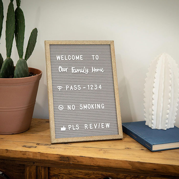 Letterboard on wooden table.