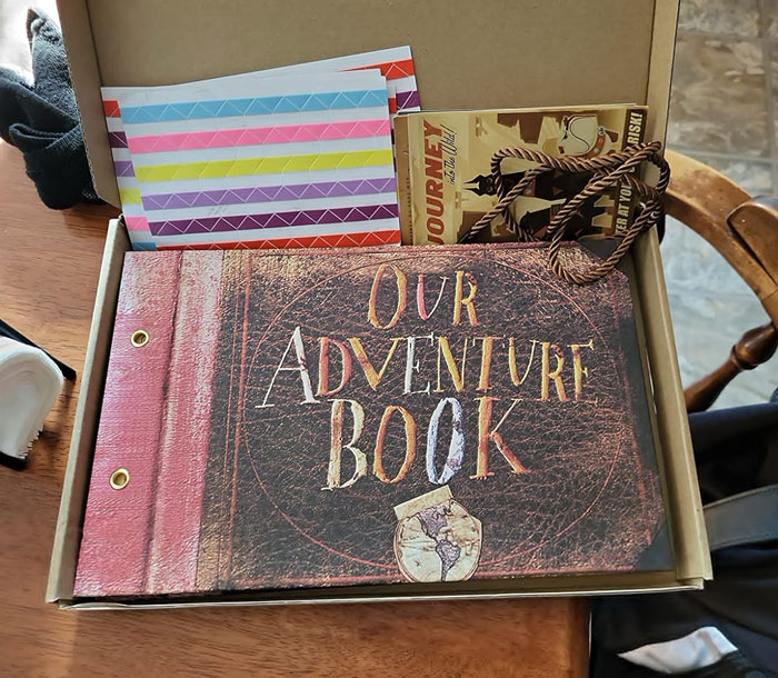 Our Adventure Book: The durable and chic scrapbook album that can hold up to 160 cherished photos - it's the perfect way to keep your love story alive. 