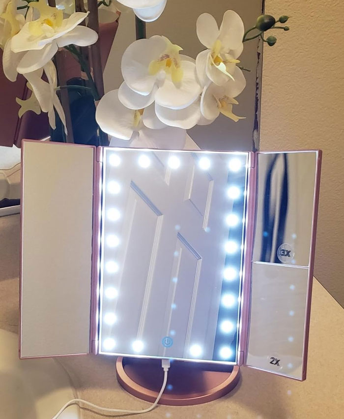Mount Tri-Fold Lighted Vanity Mirror With 21 LED Lights: Is basically her own personal Hollywood dressing room, right on her makeup table - and isn't that exactly where she deserves to be?