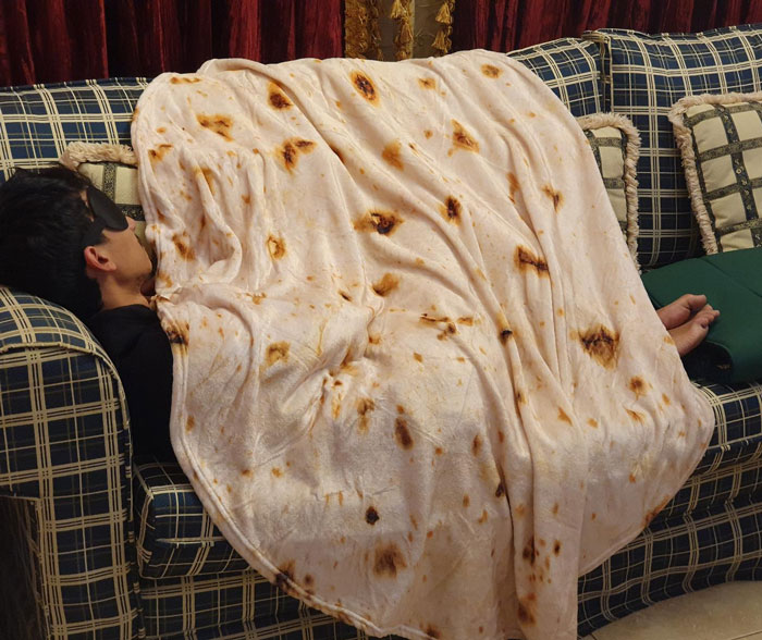 Tortilla Throw Blanket: Guaranteed to add some fun (and warmth) to any chilly night, perfect for the loved one in your life who enjoys quirky comfort.